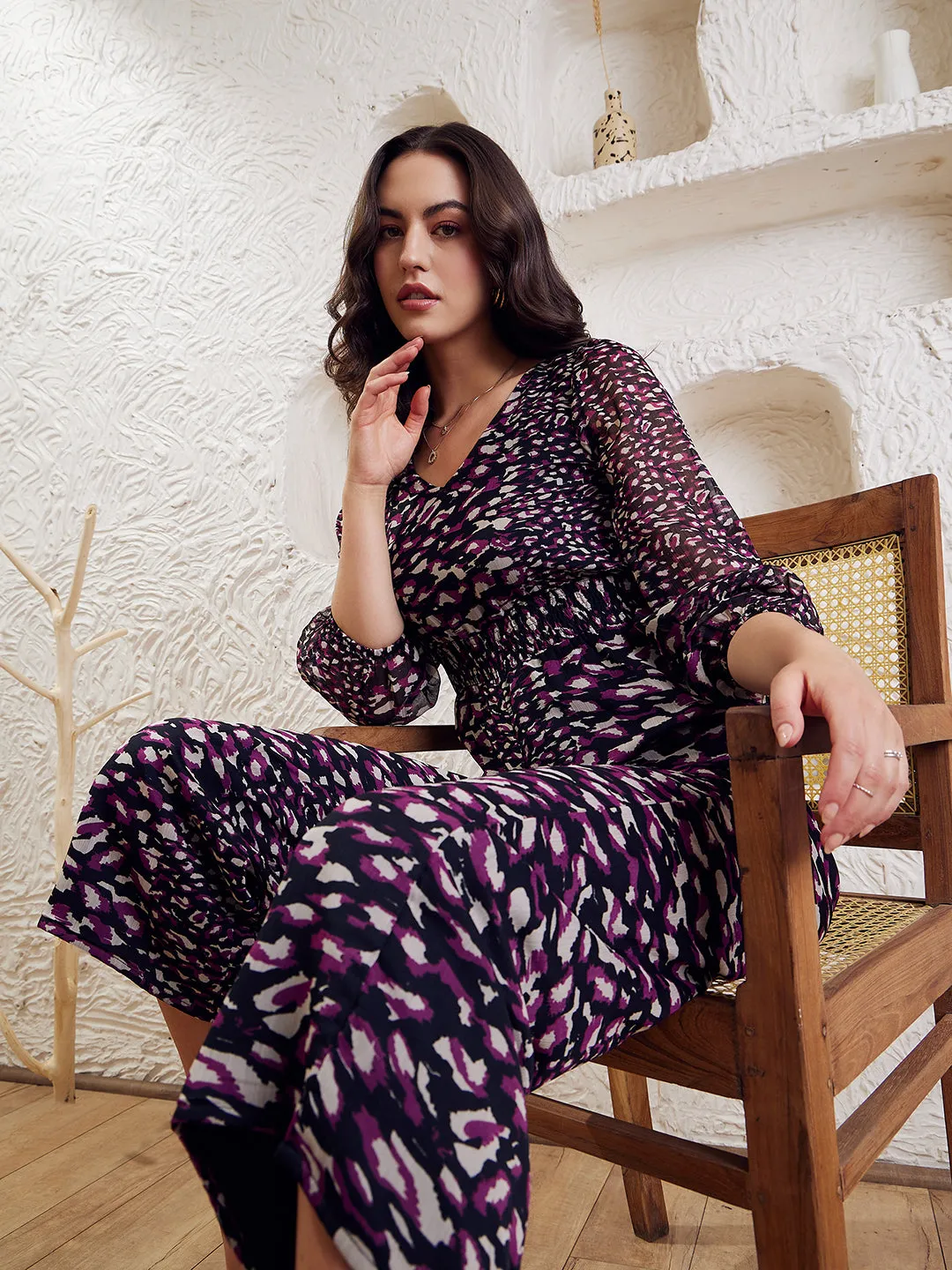 Berrylush Women Black & Purple Animal Printed V-Neck Bishop Sleeves Smocked Basic Jumpsuit